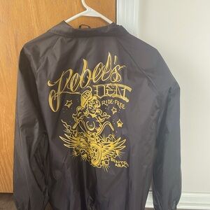 Worn a few times. Windbreaker jacket for motorcycle  riding, etc.